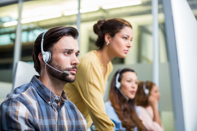 agents working in call center to solve customer service challenges