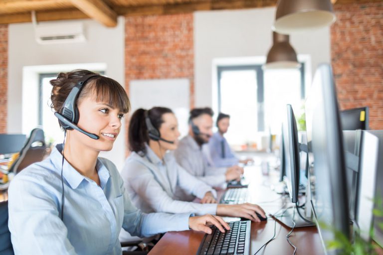 happy agents working in modern call center