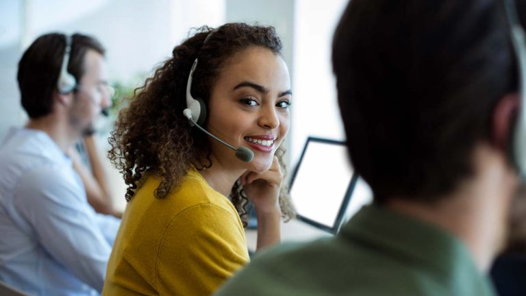 Woman with headset in contact center