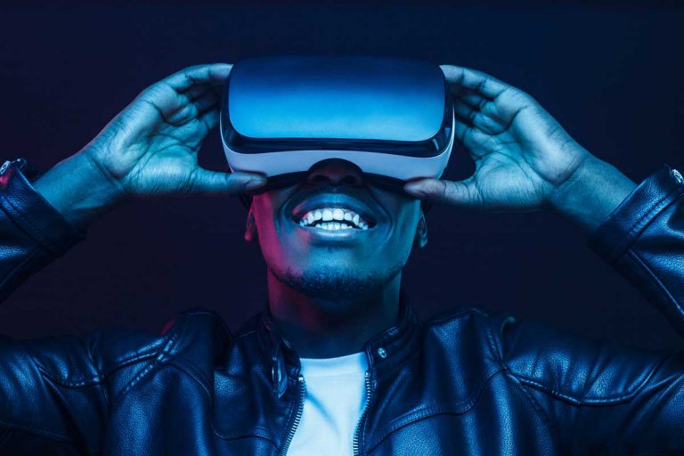 man using vr headset as example of customer experience trends in 2021
